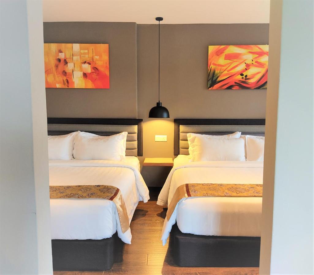 Apple Suites Hotel Sitiawan Extérieur photo