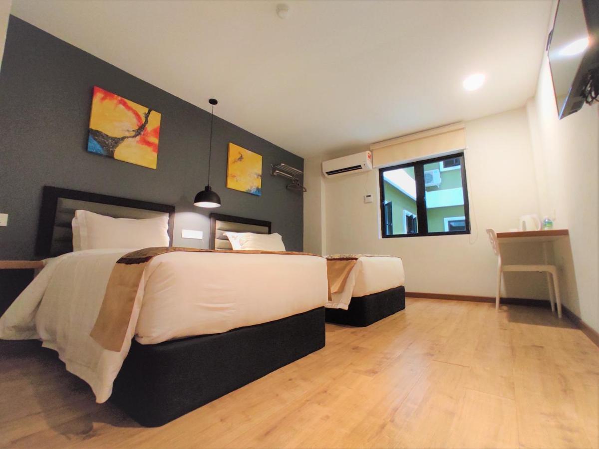 Apple Suites Hotel Sitiawan Extérieur photo