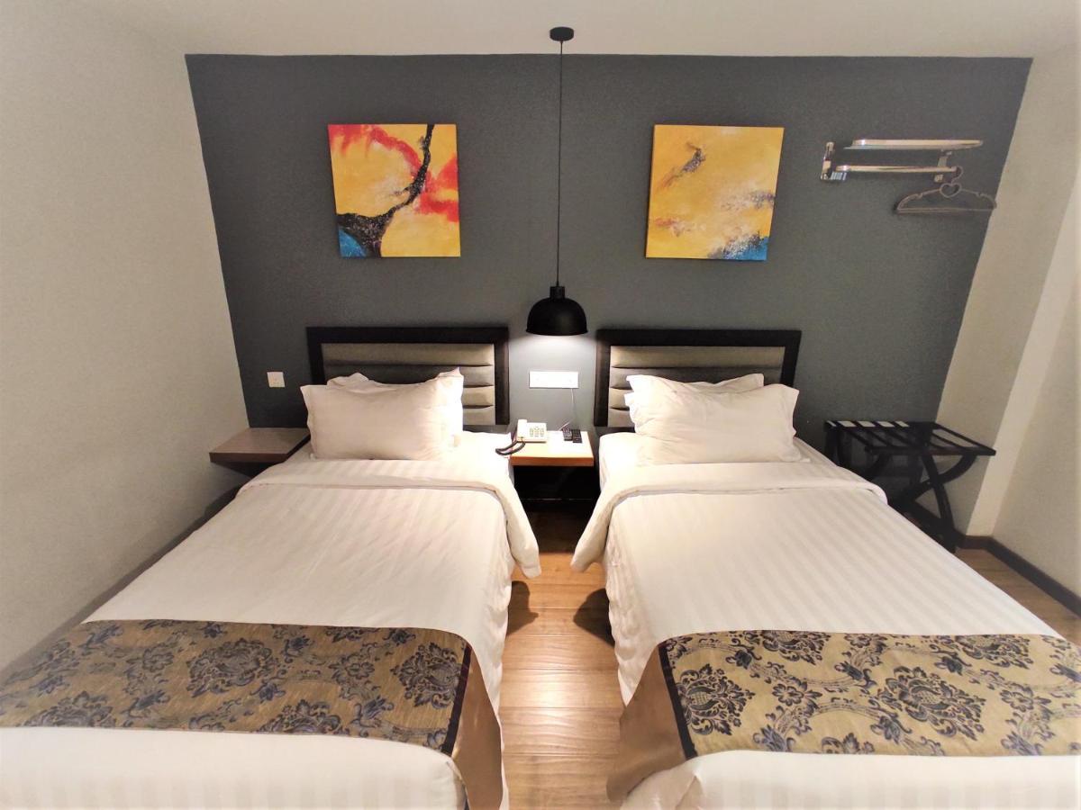 Apple Suites Hotel Sitiawan Extérieur photo