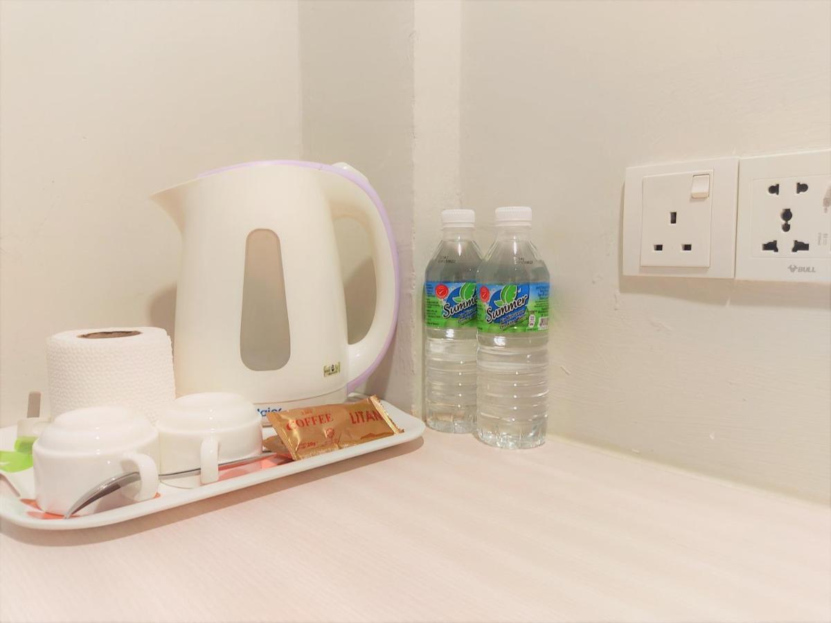 Apple Suites Hotel Sitiawan Extérieur photo