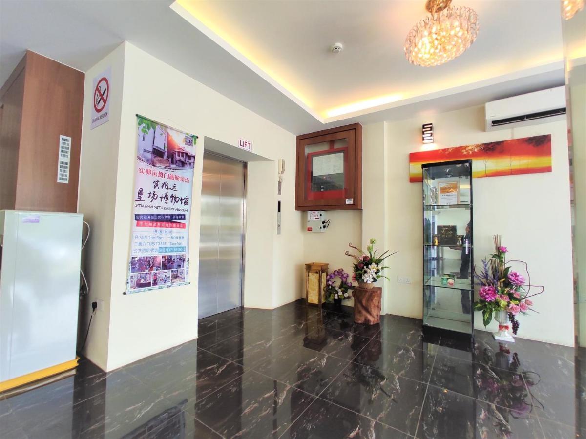 Apple Suites Hotel Sitiawan Extérieur photo