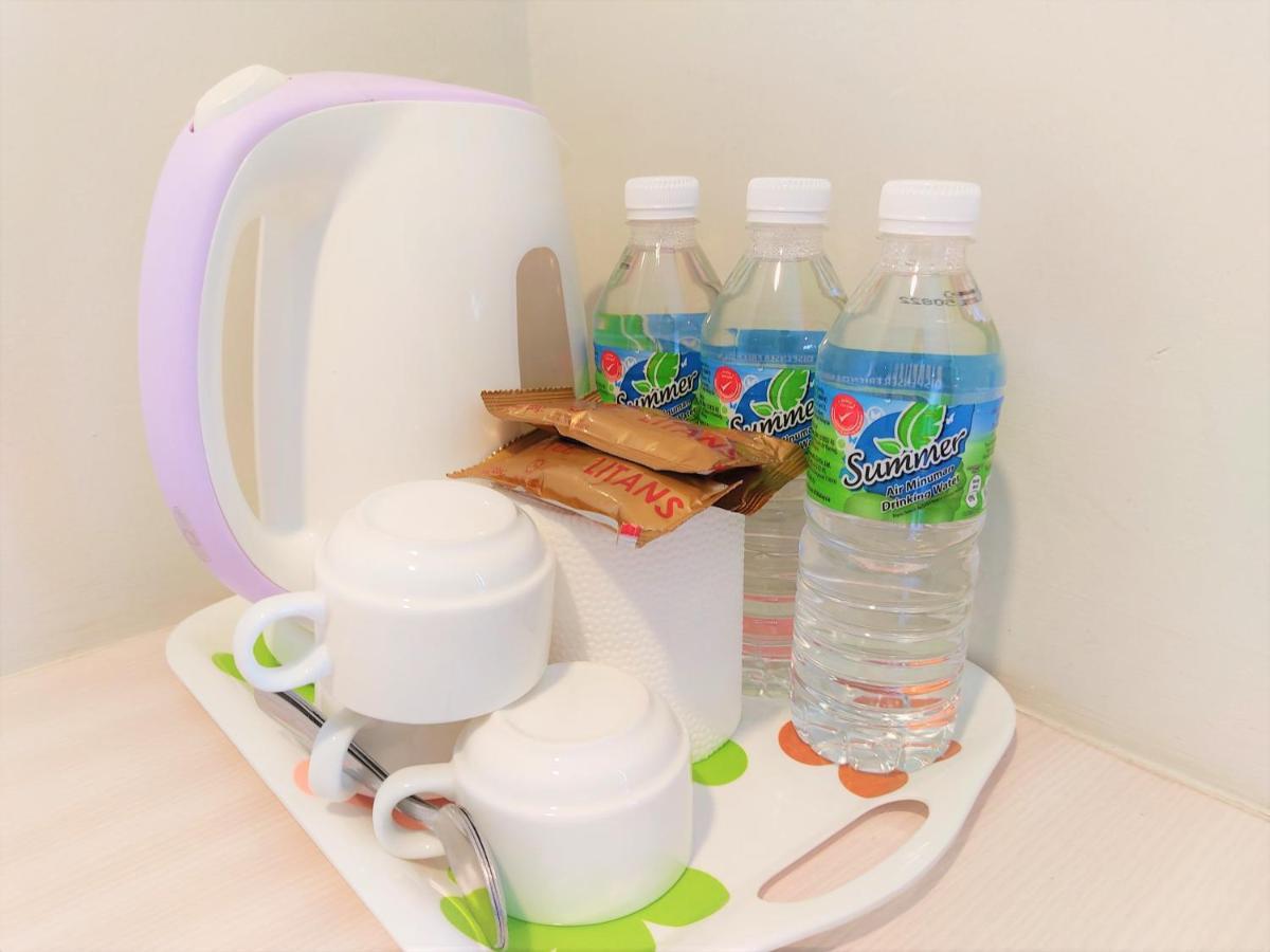 Apple Suites Hotel Sitiawan Extérieur photo