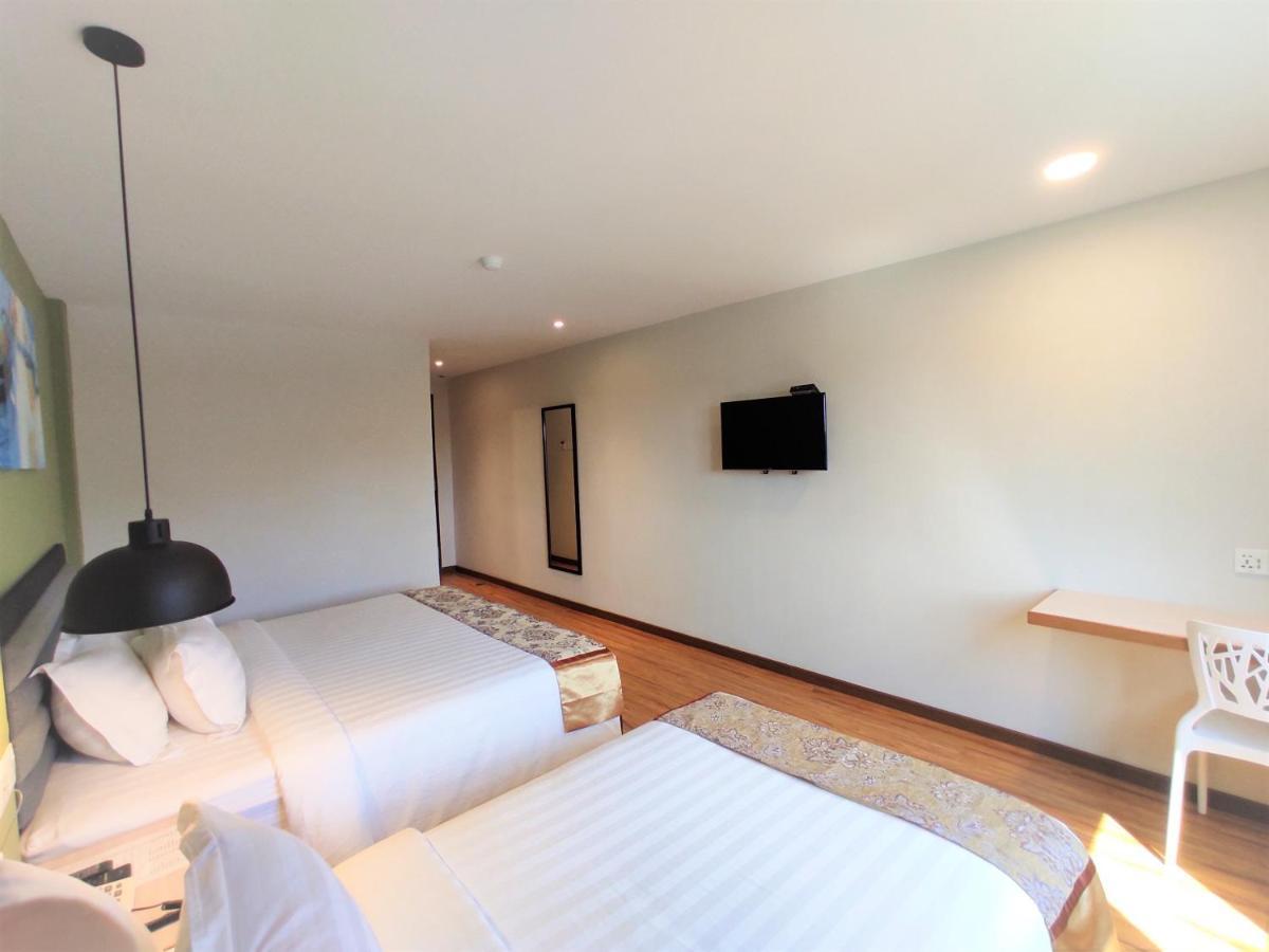 Apple Suites Hotel Sitiawan Extérieur photo