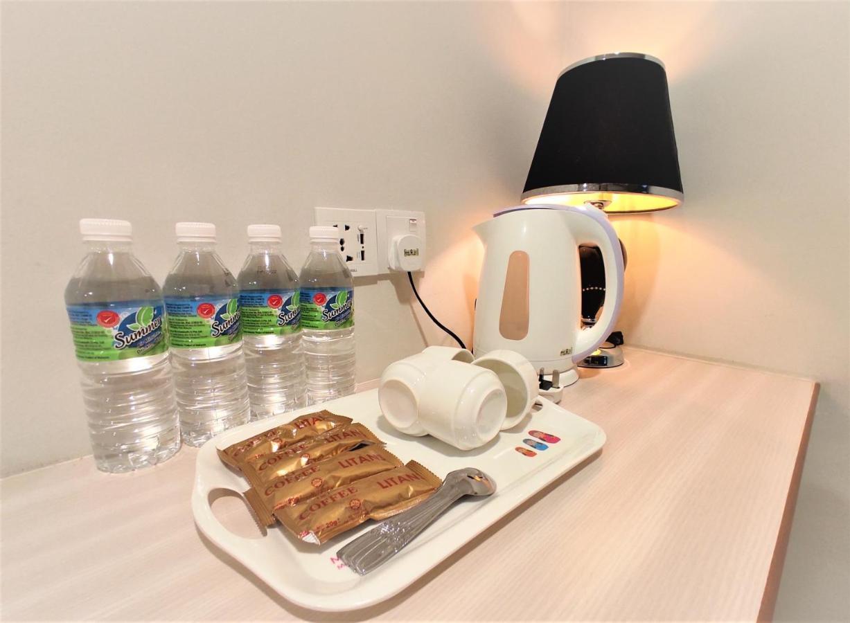 Apple Suites Hotel Sitiawan Extérieur photo