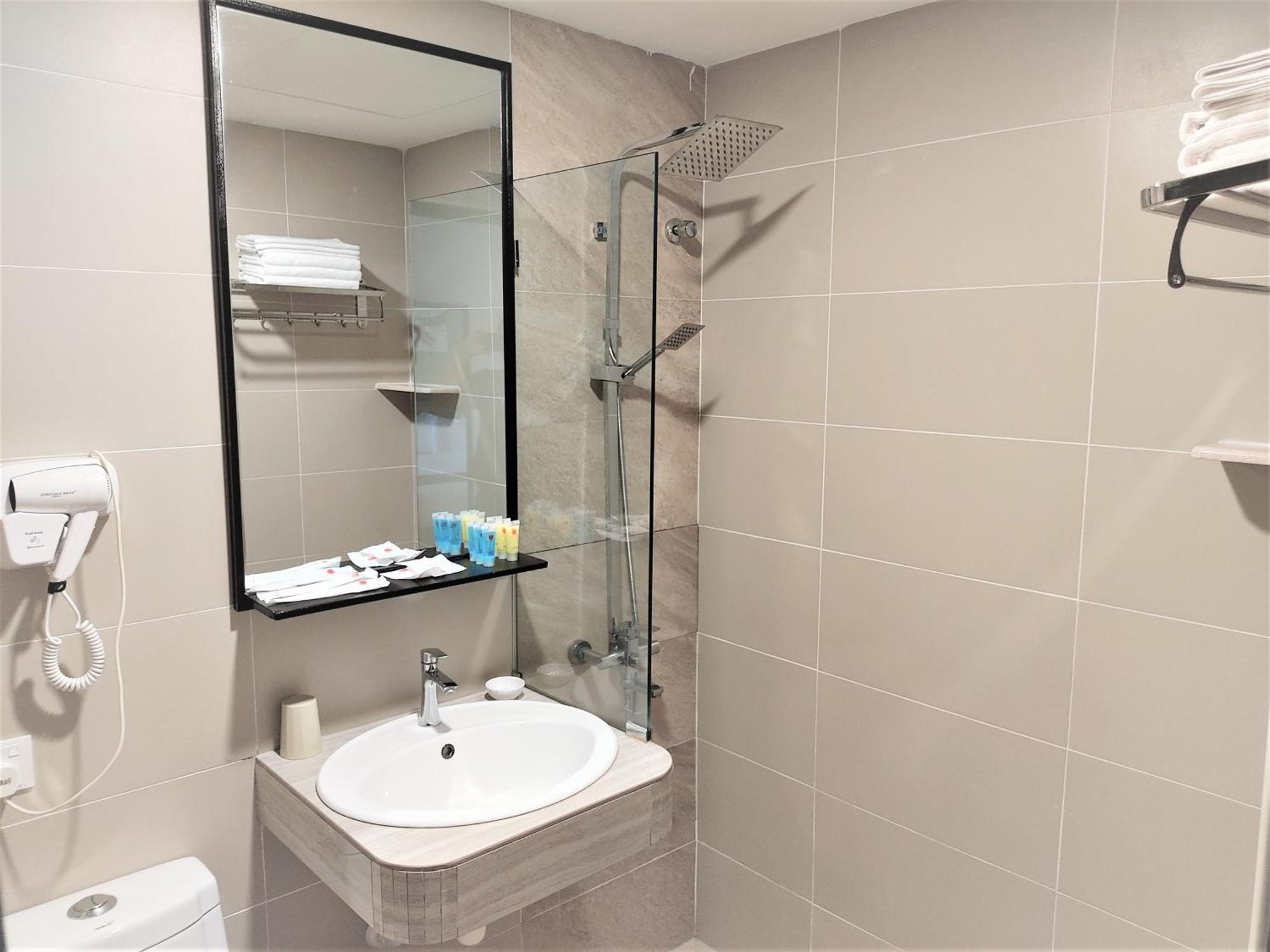 Apple Suites Hotel Sitiawan Extérieur photo